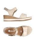 Gold backstrap platform wedge sandal with gold buckle. Remonte logo printed on brown insole.