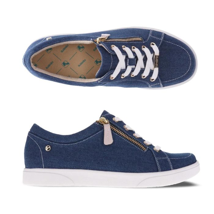 Top and side view of Revere's Ripon sneaker in denim with white laces and a gold zipper.