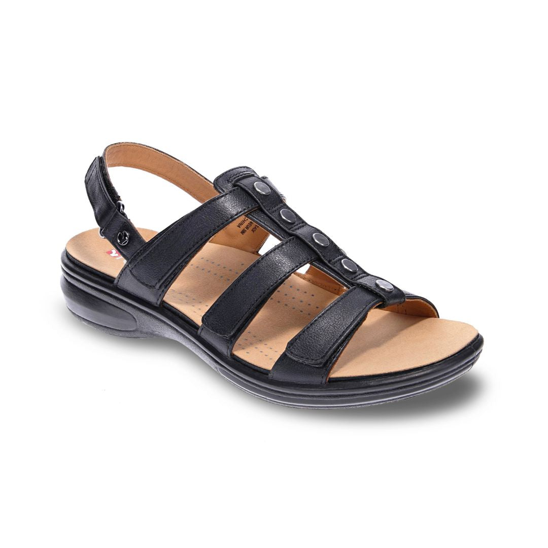 Black strappy sandal with four adjustable straps. Sandal has stud details and a black outsole.