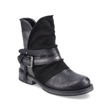 Black ankle boot with pewter buckle.
