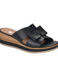 Black leather slide wedge sandal with bow.