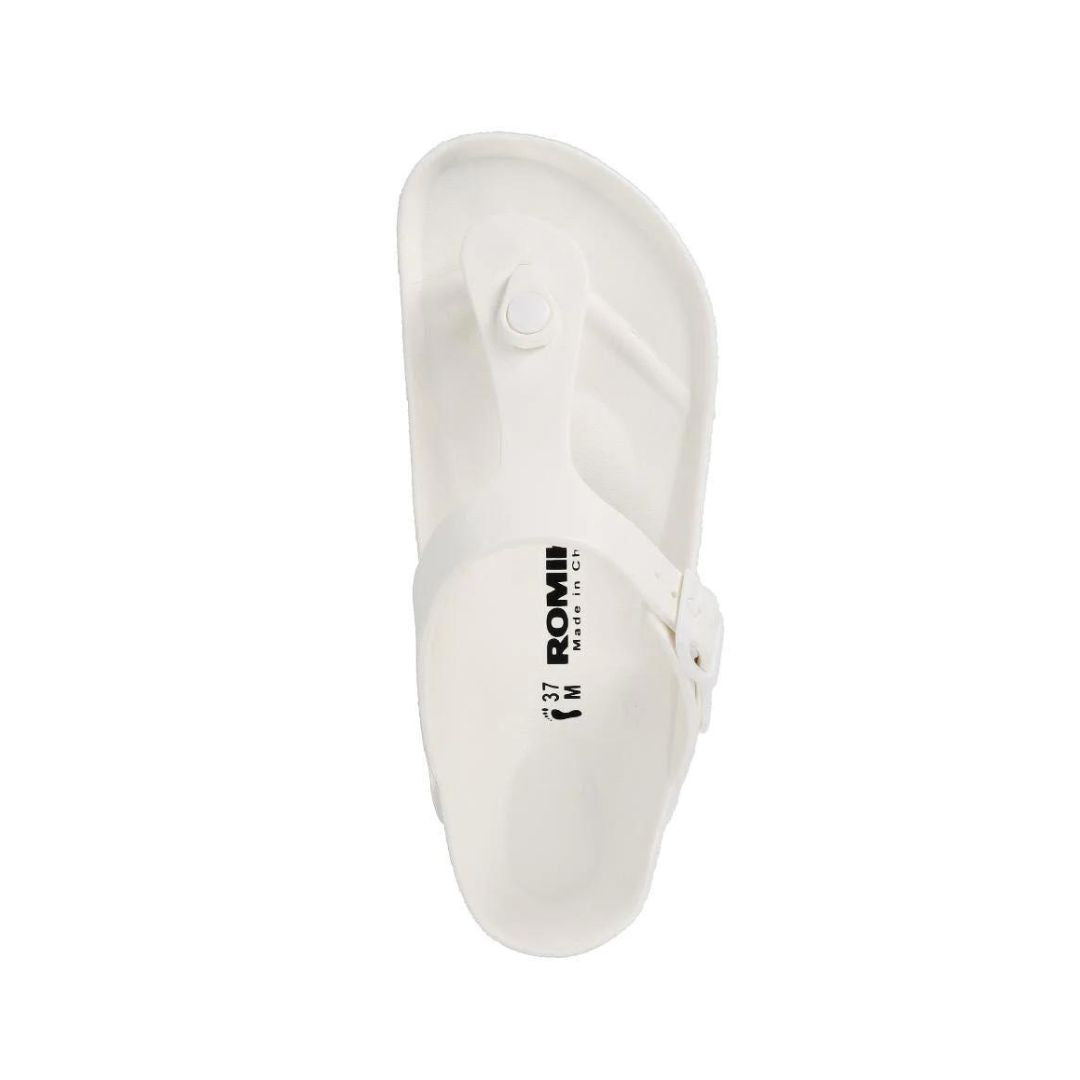Top view of white EVA thong sandal with black Romika logo on center.