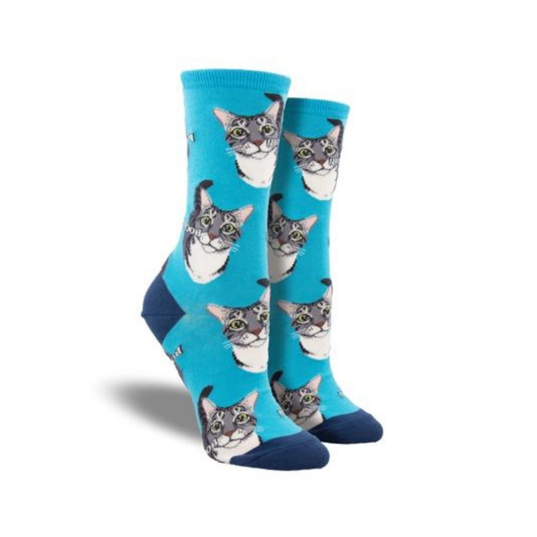 Bright blue socks with cat face prints, and "boop" wording beside cat's nose.