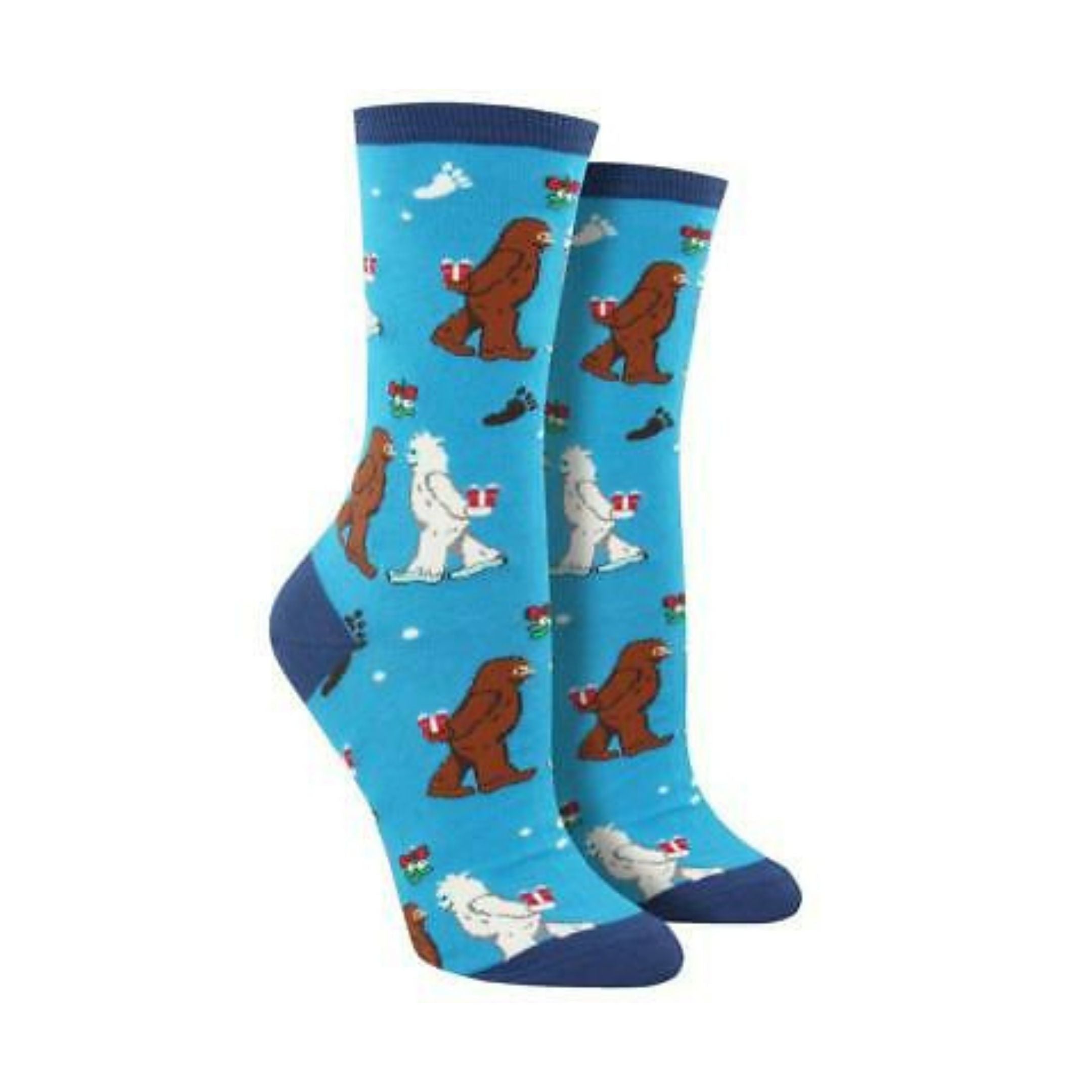 Light blue socks with yetis kissing under the mistle toe