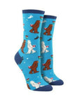 Light blue socks with yetis kissing under the mistle toe