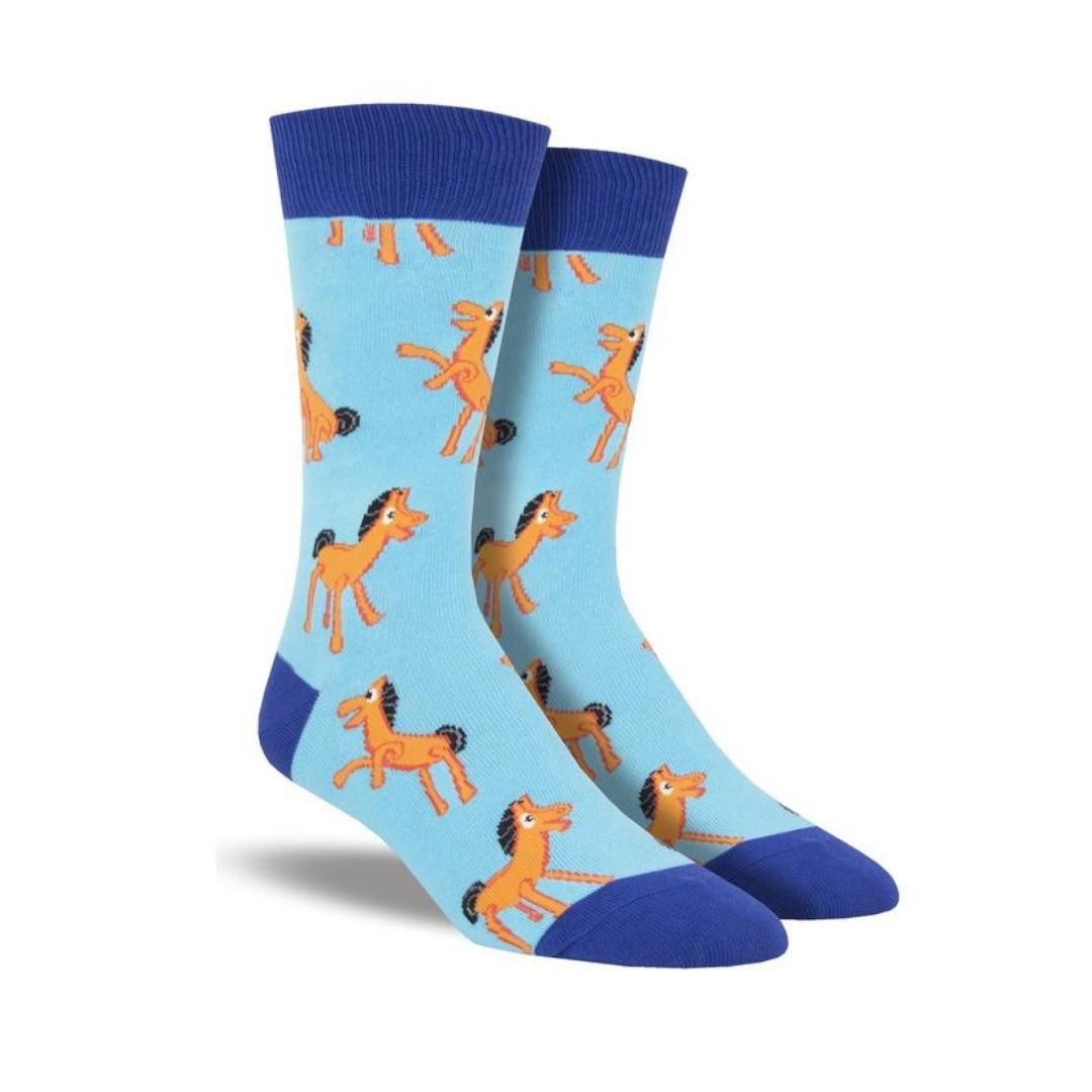 Women's Socksmith Playful Orange Pony Socks feature a fun cartoon pony print on light blue crew socks with navy toe, heel, and cuff accents.