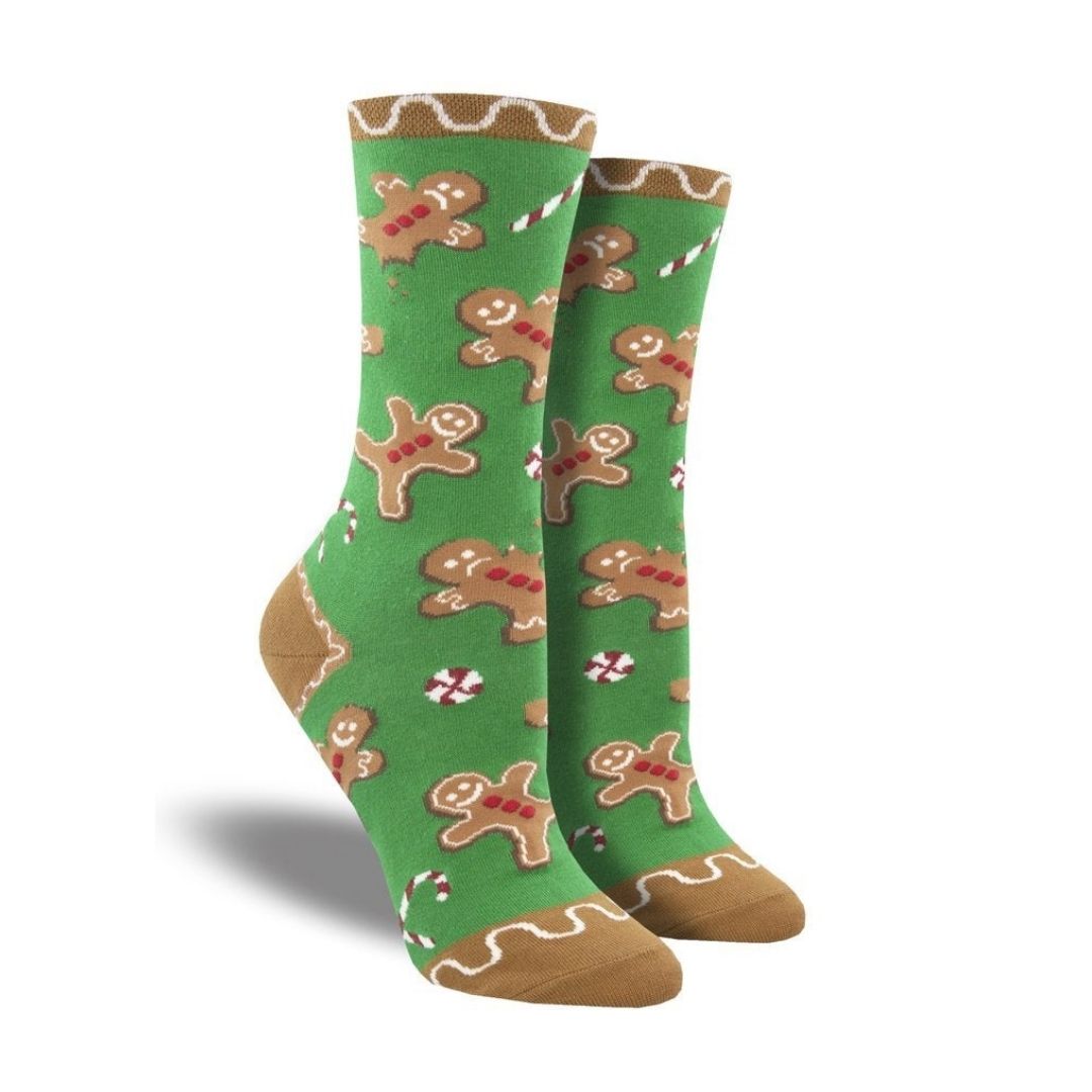 Women's Socksmith Goodie Gumdrops cotton crew socks in green with gingerbread men and candy cane print. Ideal holiday socks for Christmas outfits.