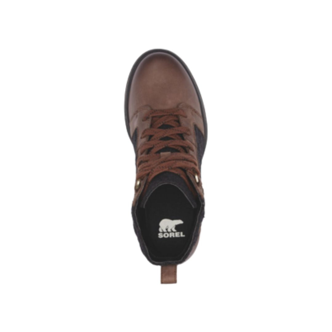 Top view of brown leather and black quilted textile boot with lace closure. White Sorel logo on heel of insole.