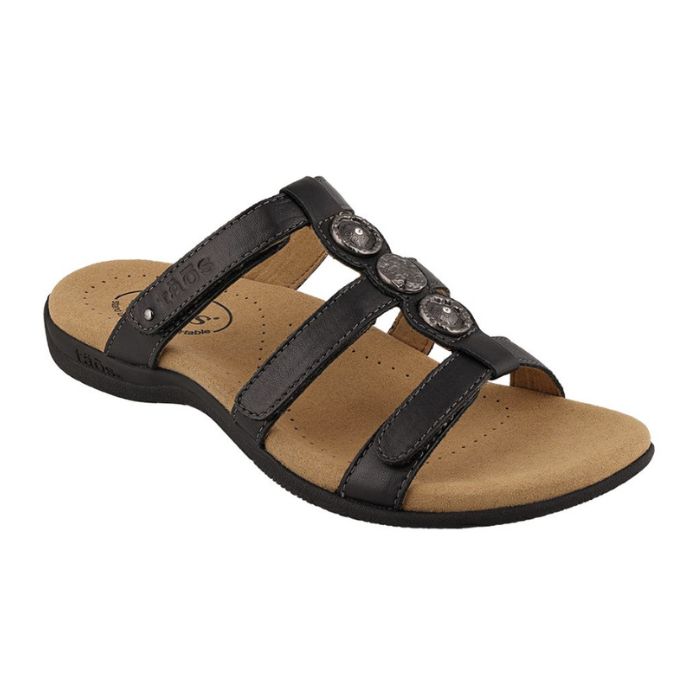 Black leather sandal with three adjustable straps and three silver medalion details on T-strap. Sandal has brown footbed and black outsole.