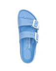 Top view of baby blue EVA sandal with two white buckles and white outsole. White Viking logo on center of footbed.