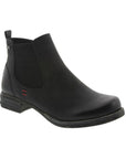 Black ankle boot with elastic goring, heel pull tab, and red accent stitching.