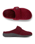 Top and side view of red slide slippers with quilted pattern and black outsole.