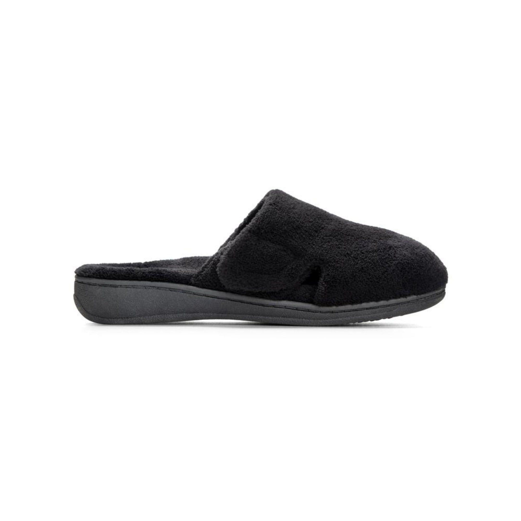 Profile of black fuzzy mule slip on slipper with black outsole.