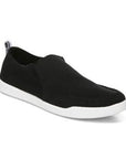 Black cotton canvas slip on sneaker with white outsole.