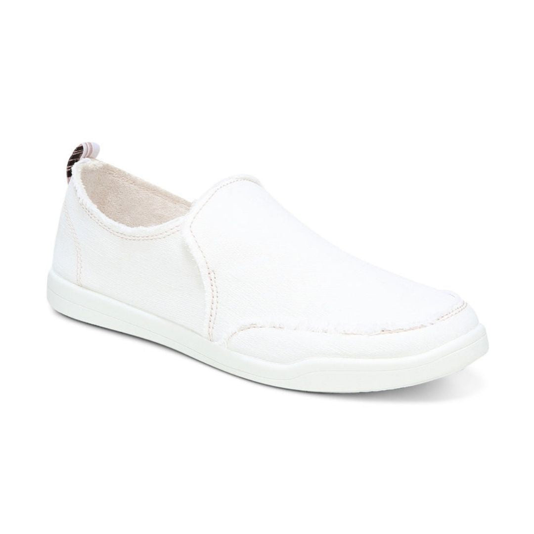 White cotton canvas slip on sneaker with white outsole.