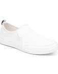White cotton canvas slip on sneaker with white outsole.
