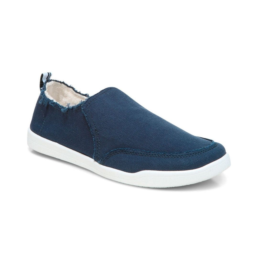 Navy cotton canvas slip on sneaker with white outsole.