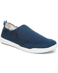 Navy cotton canvas slip on sneaker with white outsole.