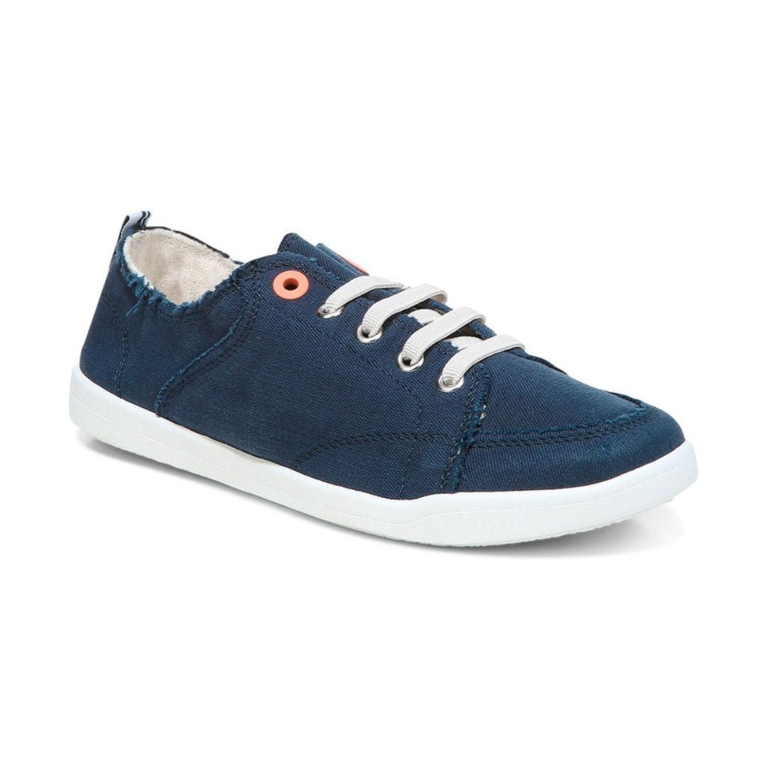 Navy cotton canvas slip on sneaker with elastic laces with white outsole.
