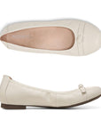 Top and side view of white ballerina flat with bow on toe. Beige footbed has Vionic logo on it.