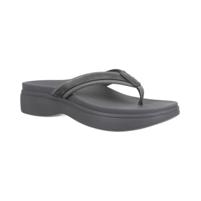 Pewter thong sandal with wedge outsole.