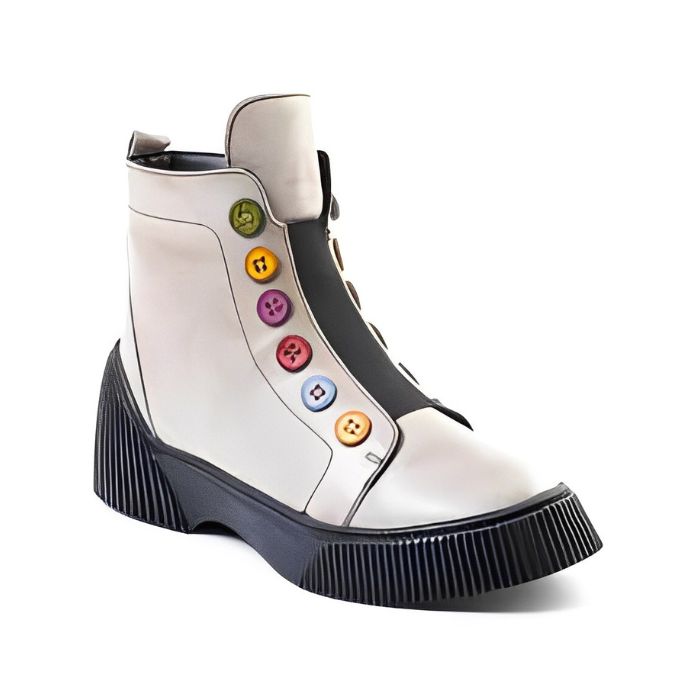 White leather ankle boots with black platform outsole. Multi-coloured buttons run up front of boot.