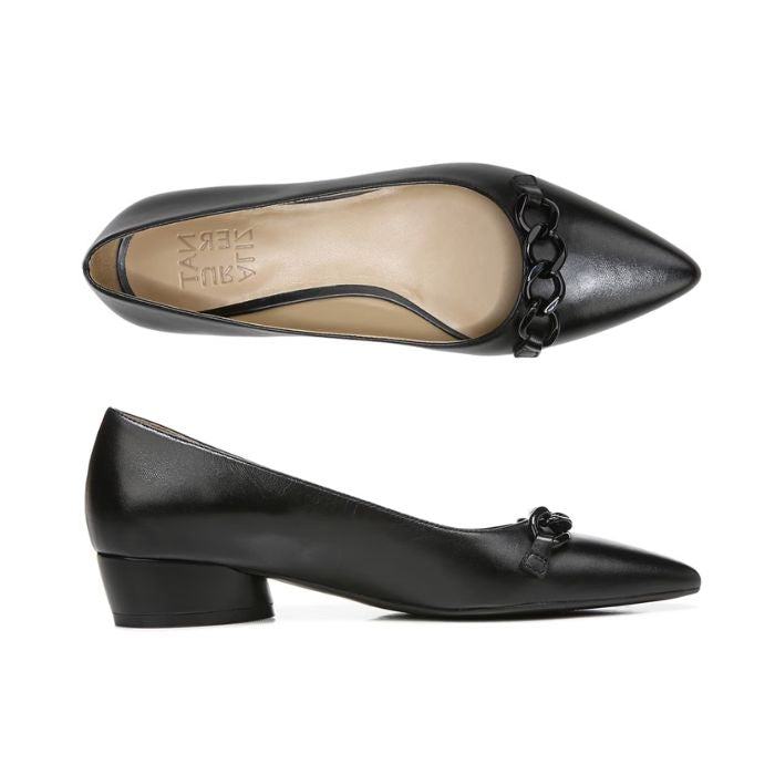 Top and side view of black leather flat with low heel and chain detailing on pointed toe. Naturalizer logo on heel of insole.