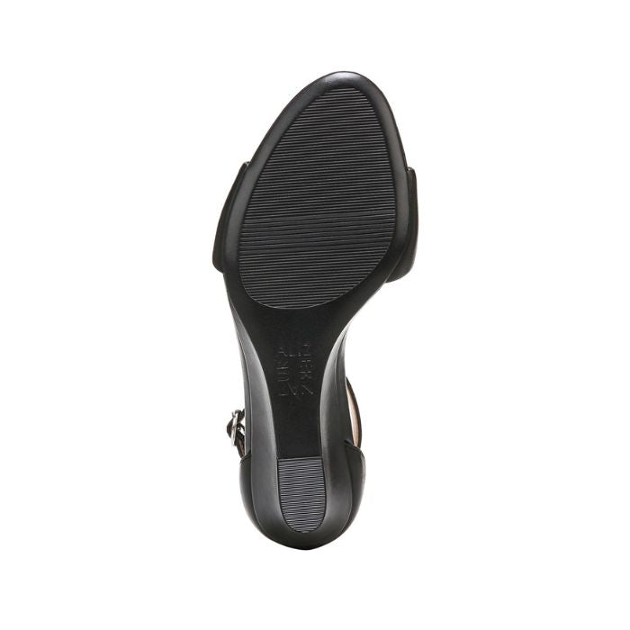 Black outsole of Naturalizer's black Vera wedge sandal.  