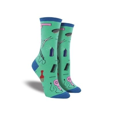 Teal socks with dark blue accents covered in hair dresser equiptment 