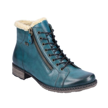 Teal ankle boot with lace and zipper closure. Boot has off white faux fur collar and brown outsole.