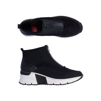 Black top zipper sneaker with white wedge outsole.