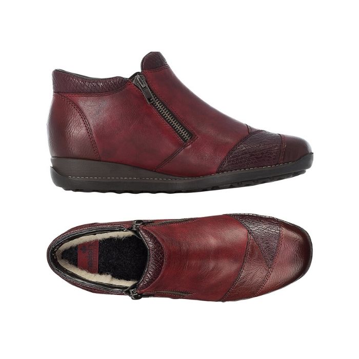 Pair of red with multi shade accents leather ankle boot with side zipper, wool lining and black outsole.