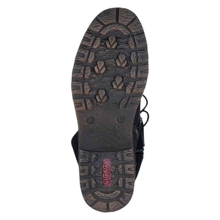 Light treaded black and brown outsole with red Rieker logo on heel.