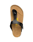 Top view of black thong style sandal with adjustable buckle strap. Yellow Viking logo in center of brown footbed.