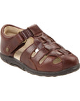 Brown fisherman sandal with velcro strap closure and dark brown rubber outsole