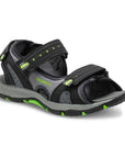 Black and grey sandal with green accents and three adjustable straps