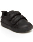 Black leather sneaker with two adjustable Velcro strap closures.