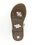 Brown outsole with pink Stride Rite logo on heel.