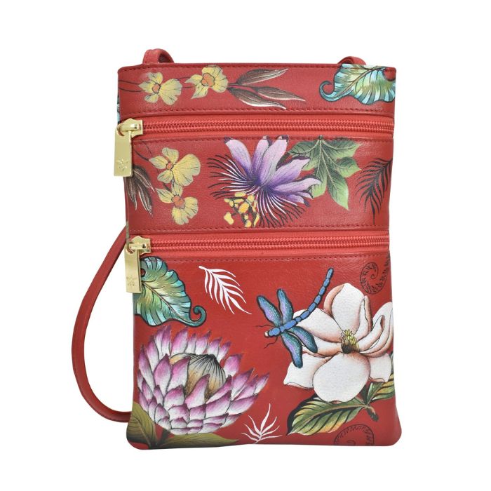 Red leather crossbody handbag with two horizontal gold zippers. Has a hand painted floral design with a dragonfly.