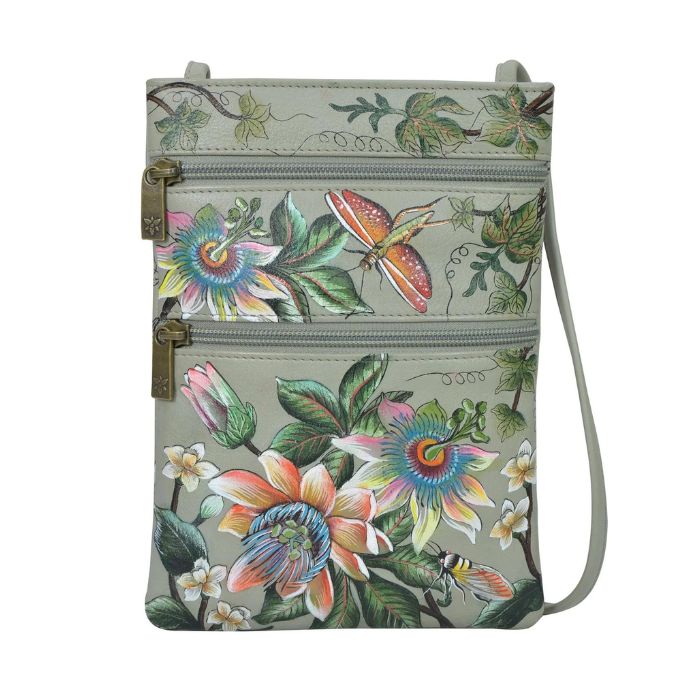 Green leather crossbody handbag with two horizontal zippers. Has a floral hand painted design with florals and insects.