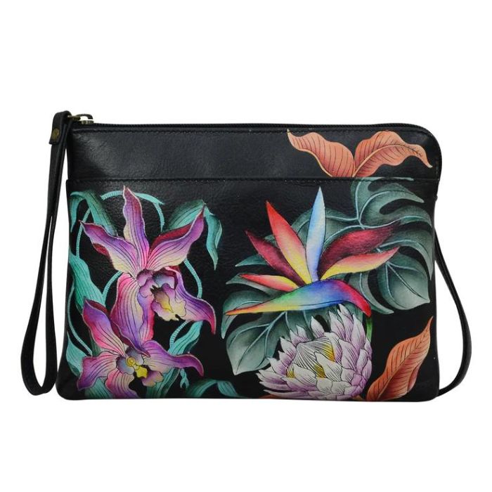 Black leather handbag with vibrant floral pattern. 