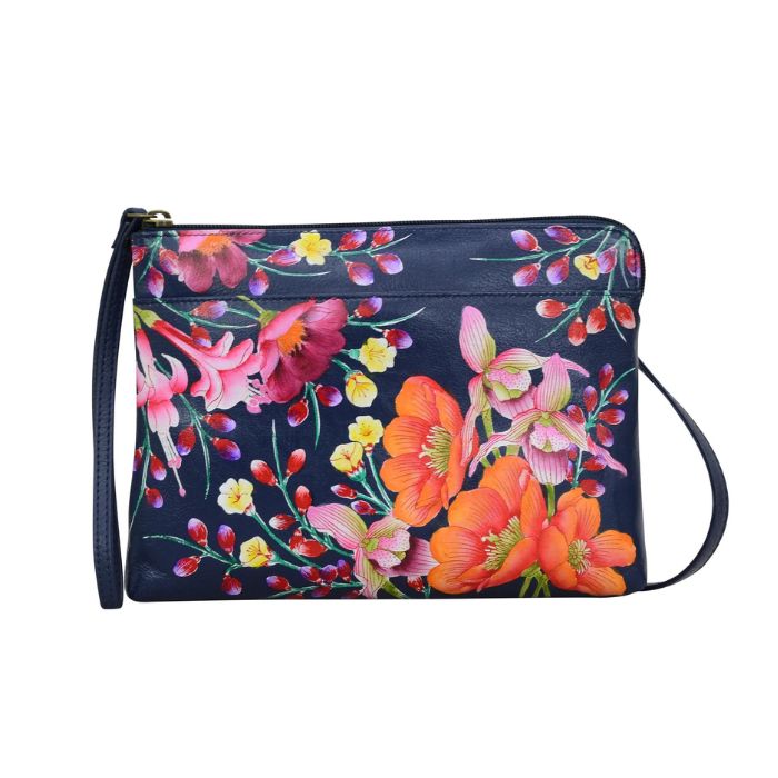 Navy leather bag with vibrant floral hand painted pattern.