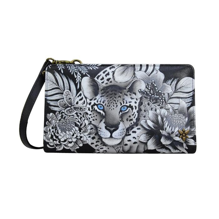 Black and white hand painted leather bag with a leopard print. 