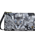 Greyscale leather wallet with bronze hardware and a removable crossbody strap. Hand painted artwork depicts white leopard with blue eyes. 