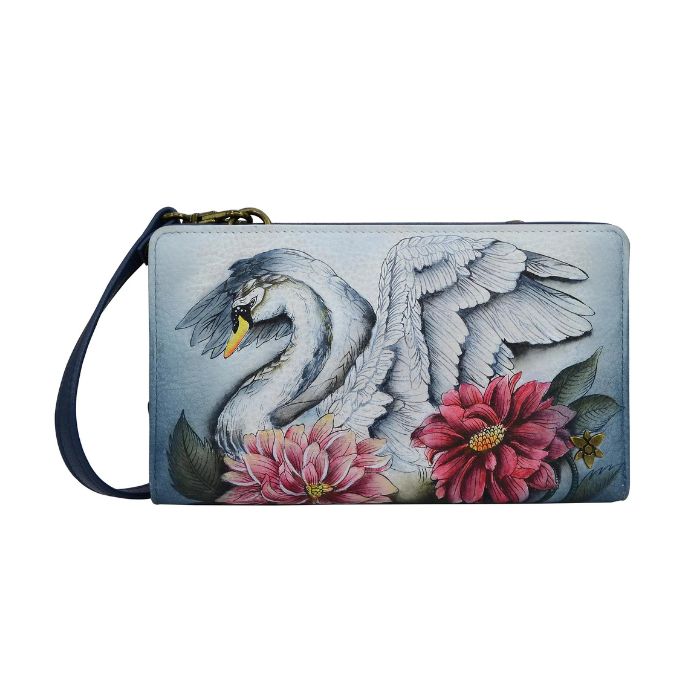 Light blue leather wallet with bronze hardware and a removable crossbody strap. Hand painted design of a white swan with red flowers.