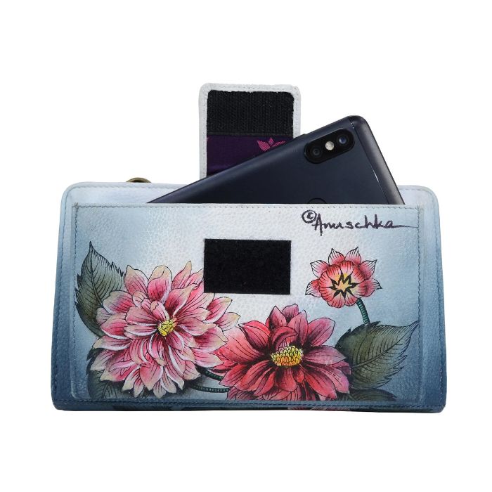 Rear exterior of a light blue leather wallet featuring a slip pocket with velcro strap closure, capable of fitting a smart phone. Hand painted floral design.