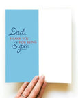Blue card which reads, "Dad, thank you for being super!"