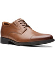 Brown leather dress shoe with laces and a toe cap. 
