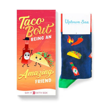 Card and socks featuring tacos and hot sauce. Card reads, "Taco 'bout being an amazing friend"