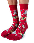 Red socks featuring cats in presents and stockings. Called feline festive.